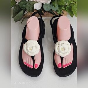 Fitflop Black Sandals with White Floral Accent